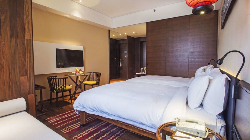 Imagen de la habitación del Hotel Wuyi Mountain Resort. Foto 15