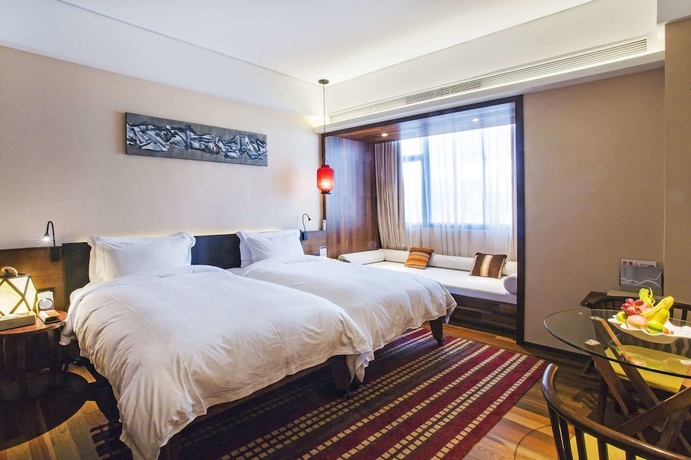 Imagen de la habitación del Hotel Wuyi Mountain Resort. Foto 16