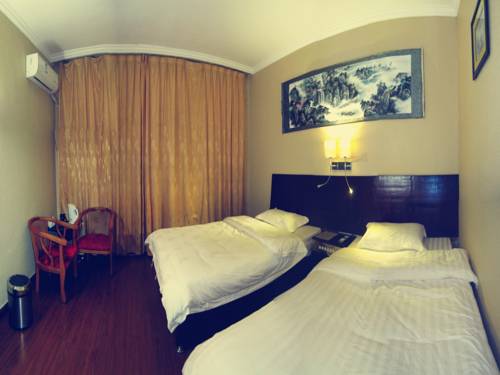 Imagen de la habitación del Hotel Wuyishan City Chun Hui Traders. Foto 2