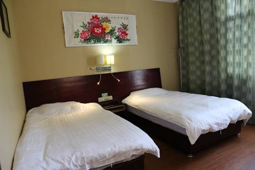 Imagen de la habitación del Hotel Wuyishan City Chun Hui Traders. Foto 3