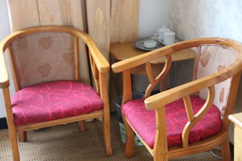 Imagen de la habitación del Hotel Wuyishan City Chun Hui Traders. Foto 4