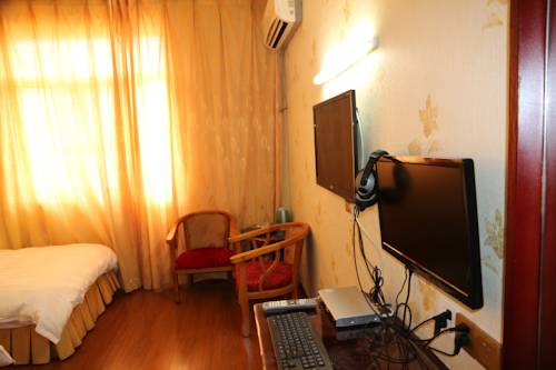 Imagen de la habitación del Hotel Wuyishan City Chun Hui Traders. Foto 6