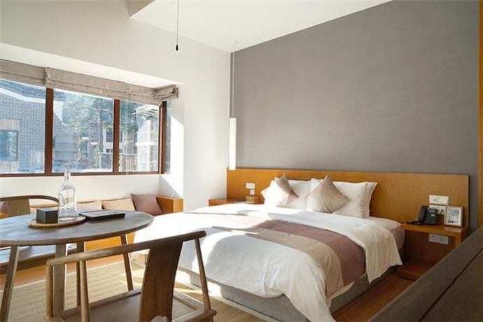 Imagen de la habitación del Hotel Wuyishan Demaotang Resort. Foto 3