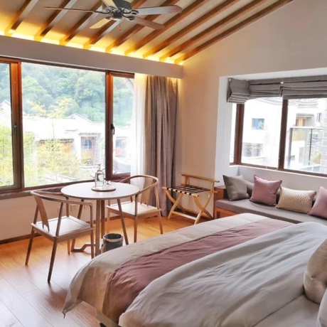 Imagen de la habitación del Hotel Wuyishan Demaotang Resort. Foto 7