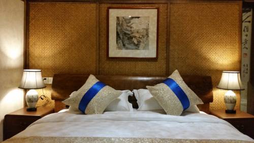 Imagen de la habitación del Hotel Wuyuan Huangling Villa. Foto 5