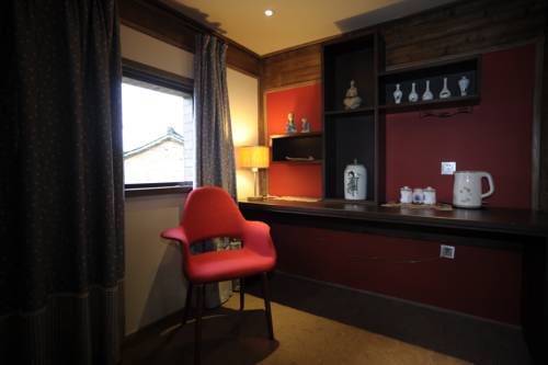 Imagen de la habitación del Hotel Wuyuan Huangling Villa. Foto 6