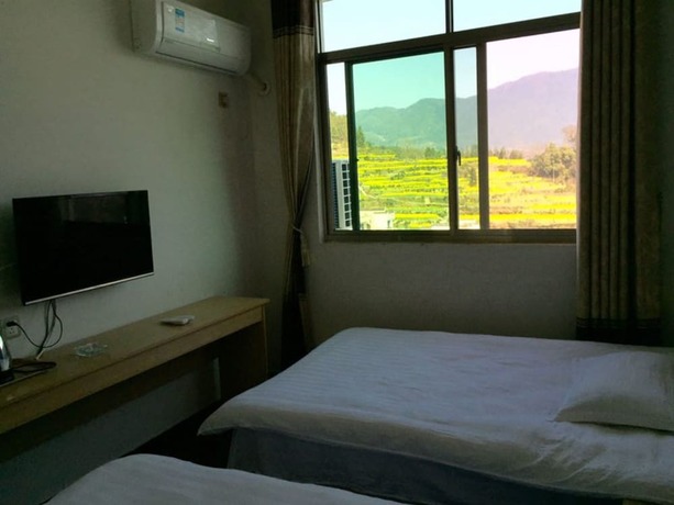 Imagen general del Hotel Wuyuan Jiangling View Inn. Foto 14
