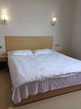 Imagen de la habitación del Hotel Wuyuan Jiangling View Inn. Foto 20