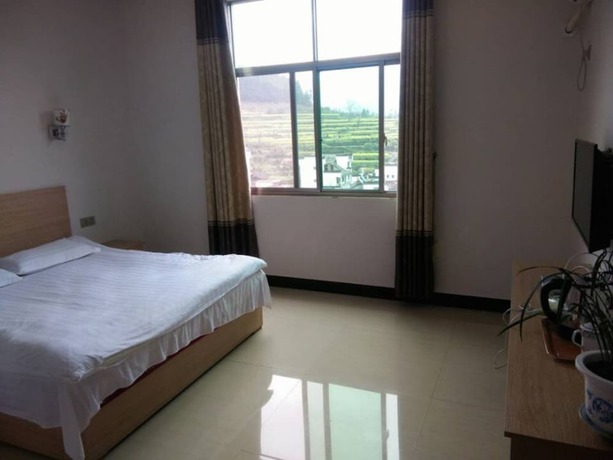 Imagen general del Hotel Wuyuan Jiangling View Inn. Foto 16