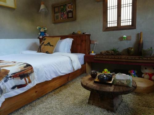 Imagen de la habitación del Hotel Wuyuan Qiye Yanxiang Guesthouse. Foto 9