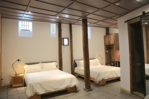 Imagen de la habitación del Hotel Wuyuan Skywells. Foto 8