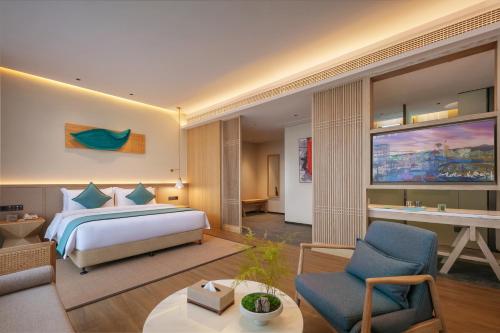 Imagen de la habitación del Hotel Wuyuan Wunvzhou chasheng hotel. Foto 15