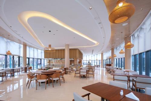 Imagen general del Hotel Wuyuan Wunvzhou chasheng hotel. Foto 2