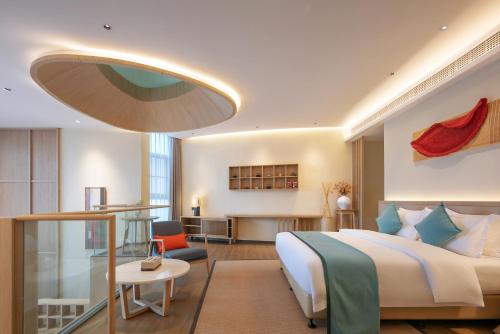 Imagen general del Hotel Wuyuan Wunvzhou chasheng hotel. Foto 6