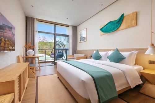 Imagen general del Hotel Wuyuan Wunvzhou chasheng hotel. Foto 9