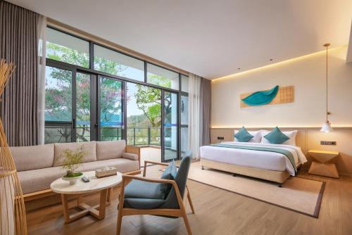 Imagen de la habitación del Hotel Wuyuan Wunvzhou chasheng hotel. Foto 19