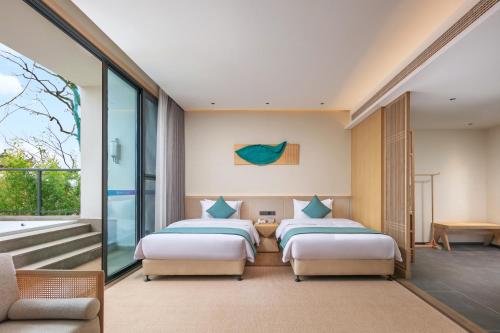 Imagen general del Hotel Wuyuan Wunvzhou chasheng hotel. Foto 12