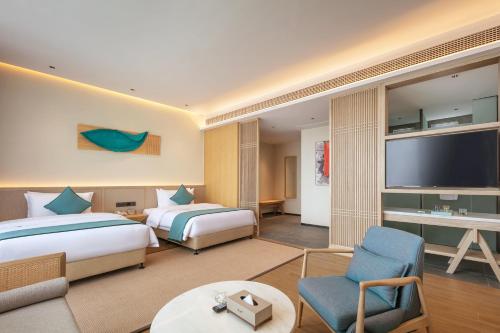 Imagen general del Hotel Wuyuan Wunvzhou chasheng hotel. Foto 13