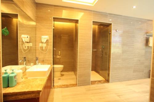 Imagen de la habitación del Hotel Wuyuan Xingjiang Bay Holiday. Foto 7