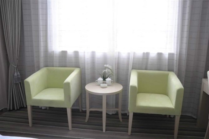 Imagen de la habitación del Hotel Wuyue Phoenix Branch. Foto 3