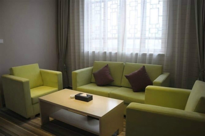 Imagen de la habitación del Hotel Wuyue Phoenix Branch. Foto 4
