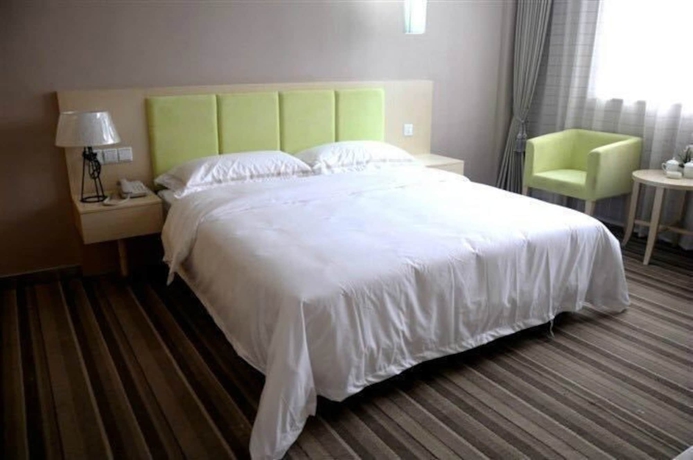Imagen de la habitación del Hotel Wuyue Phoenix Branch. Foto 5