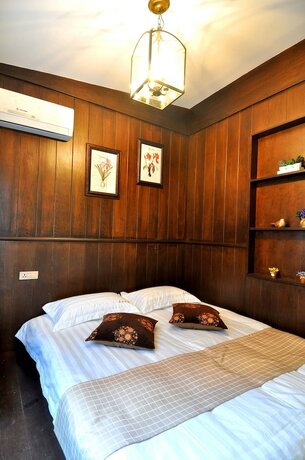 Imagen de la habitación del Hotel Wuzhen Chenhui Impression Theme Inn. Foto 15