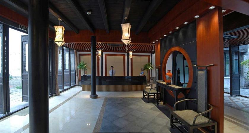 Imagen de los interiores del Hotel Wuzhen Clubhouse. Foto 8