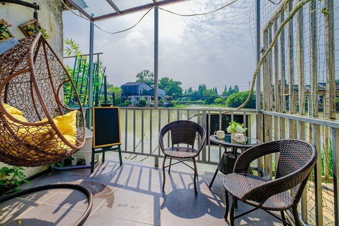 Imagen de la habitación del Hotel Wuzhen Fuchang Bridge Inn. Foto 16