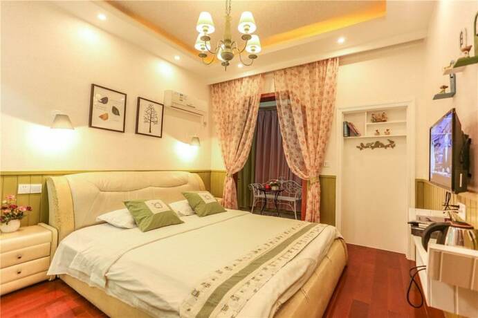 Imagen de la habitación del Hotel Wuzhen HE and SHE Inn. Foto 12