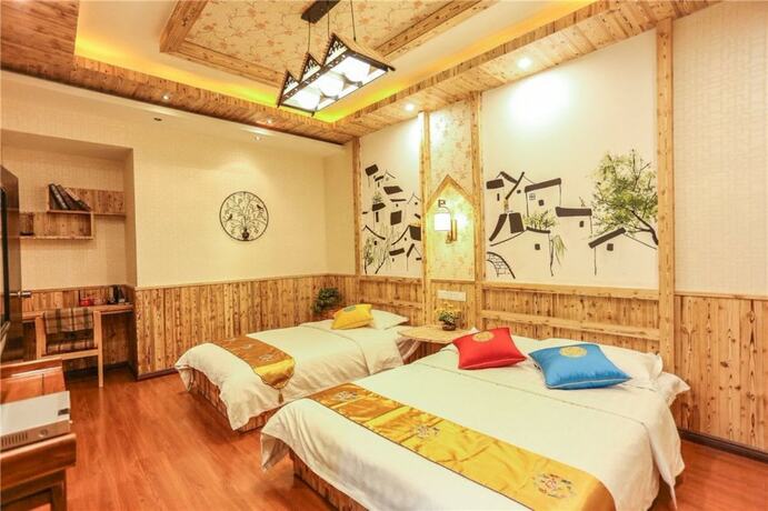 Imagen de la habitación del Hotel Wuzhen HE and SHE Inn. Foto 13