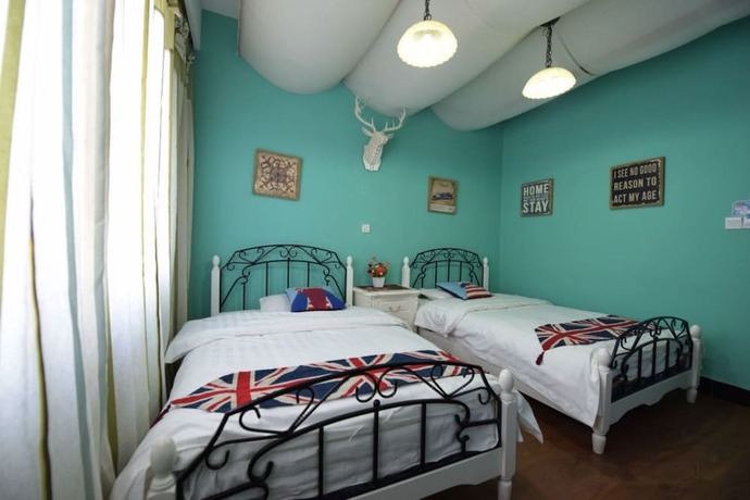 Imagen de la habitación del Hotel Wuzhen HE and SHE Inn. Foto 15