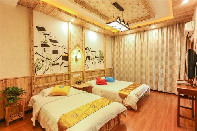 Imagen de la habitación del Hotel Wuzhen HE and SHE Inn. Foto 17