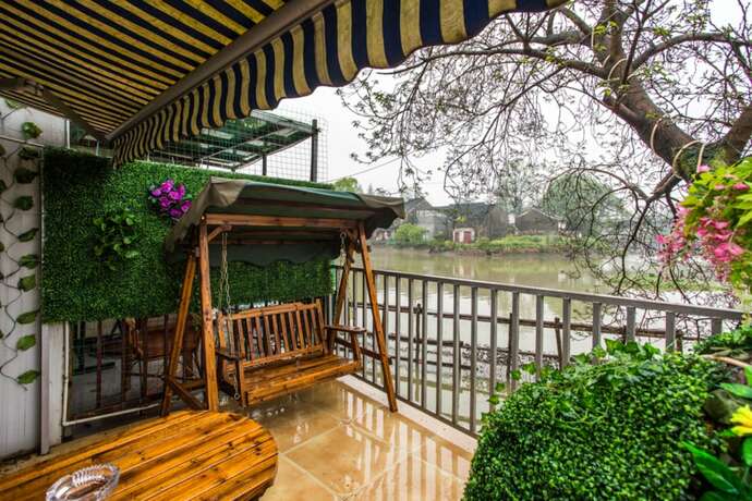 Imagen de la habitación del Hotel Wuzhen Helan Bridge Inn. Foto 11