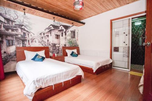 Imagen de la habitación del Hotel Wuzhen Rulian Time Theme Guesthouse. Foto 8
