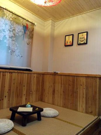 Imagen de la habitación del Hotel Wuzhen Rulian Time Theme Guesthouse. Foto 9
