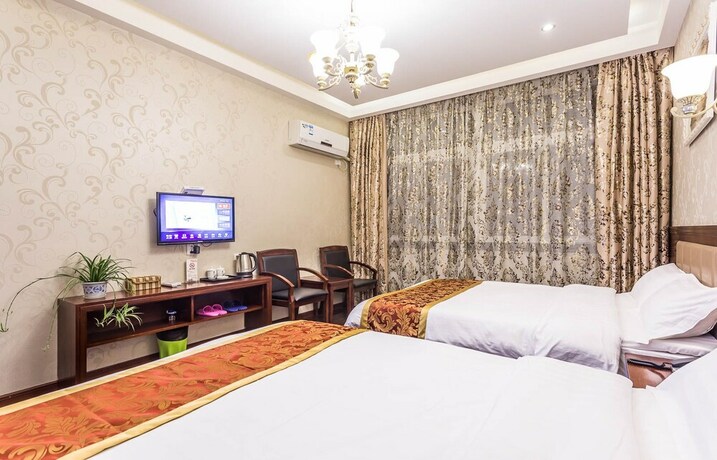 Imagen de la habitación del Hotel Wuzhen Tongyuan Shuixiang Guest House. Foto 15