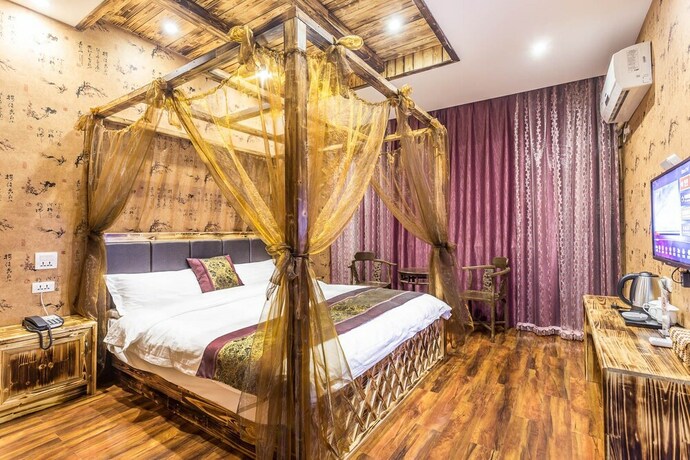 Imagen de la habitación del Hotel Wuzhen Tongyuan Shuixiang Guest House. Foto 16