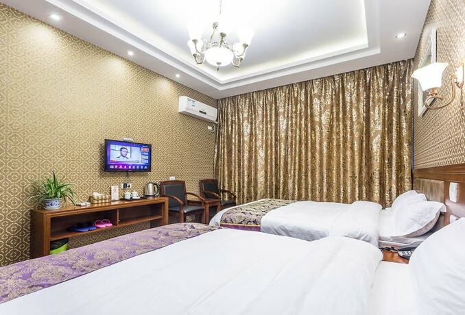 Imagen de la habitación del Hotel Wuzhen Tongyuan Shuixiang Guest House. Foto 22