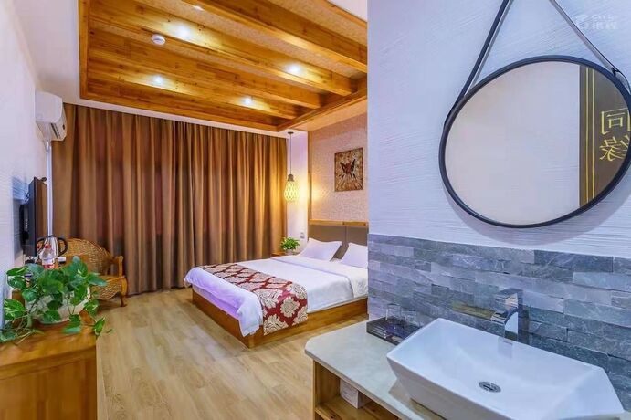 Imagen de la habitación del Hotel Wuzhen Tongyuan Shuixiang Guest House. Foto 23
