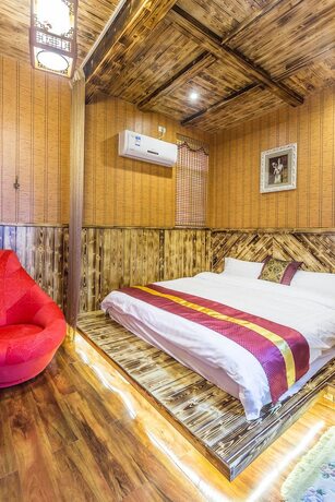 Imagen de la habitación del Hotel Wuzhen Tongyuan Shuixiang Guest House. Foto 31