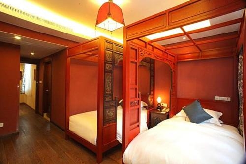 Imagen de la habitación del Hotel Wuzhen Waterside Resort. Foto 5