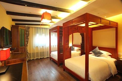 Imagen de la habitación del Hotel Wuzhen Waterside Resort. Foto 6