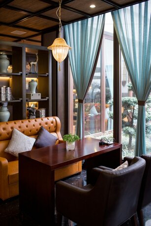 Imagen del bar/restaurante del Hotel Wuzhen Yourge Garden. Foto 10