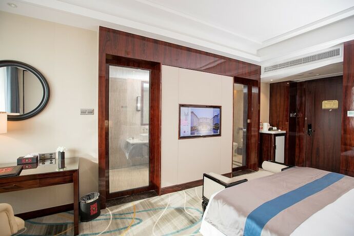 Imagen de la habitación del Hotel Wuzhen Yourge Garden. Foto 21