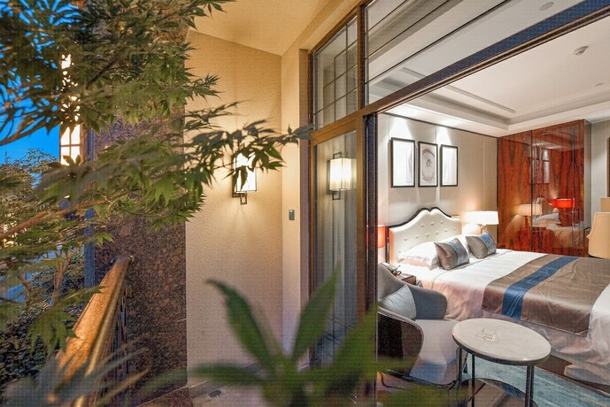 Imagen de la habitación del Hotel Wuzhen Yourge Garden. Foto 22