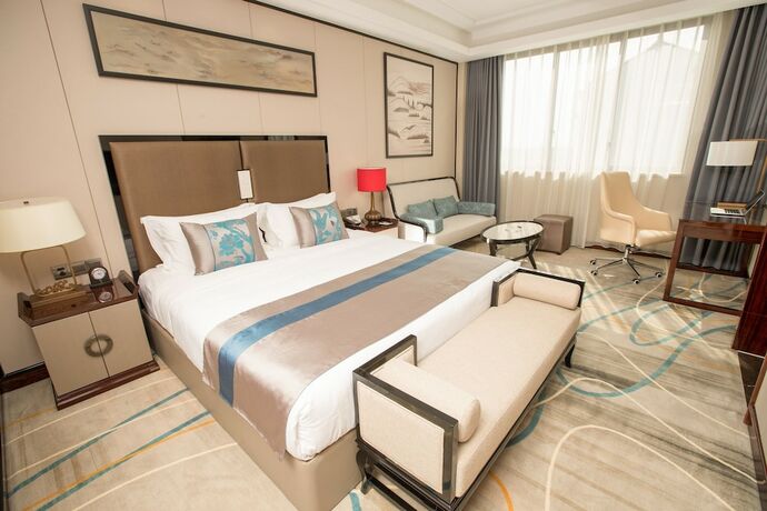 Imagen de la habitación del Hotel Wuzhen Yourge Garden. Foto 24