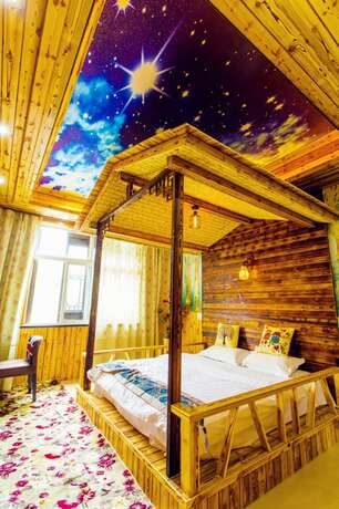Imagen de la habitación del Hotel Wuzhen Youyou Inn. Foto 11