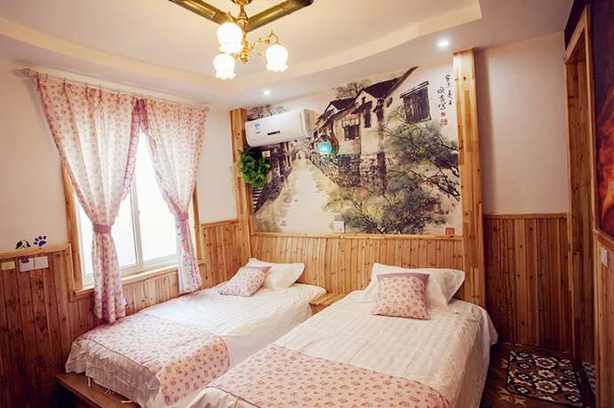 Imagen de la habitación del Hotel Wuzhen Youyou Inn. Foto 15