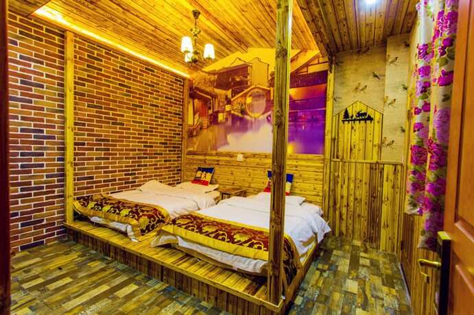Imagen de la habitación del Hotel Wuzhen Youyou Inn. Foto 16